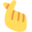 hand with index finger and thumb crossed